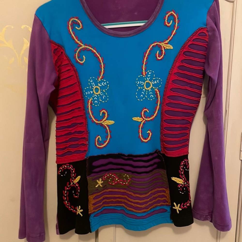 Rising International Top. L.